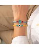 Χειροποίητο βραχιόλι της Excite Fashion Jewellery, με στρογγυλό λευκό ματάκι, κίτρινες και τιρκουάζ χάντρες. B-1760-22 Κοσμήματα