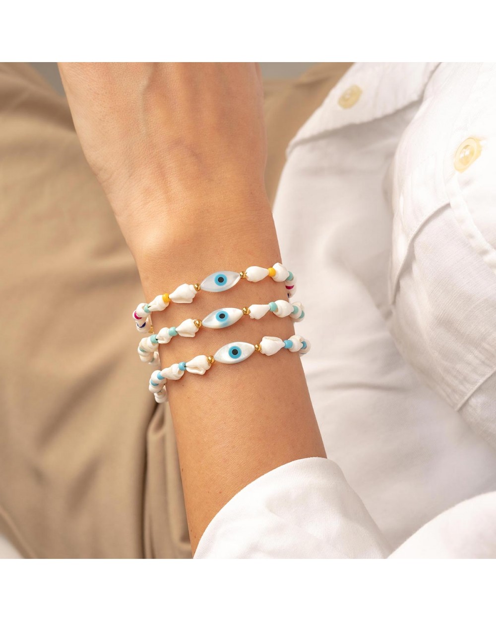 Χειροποίητο  βραχιόλι της Excite Fashion Jewellery,οβάλ ματάκι, κοχυλάκια και βεραμάν χάντρες, από επιχρυσωμένο ανοξείδωτο ατσάλι. B-1763-30 Κοσμήματα