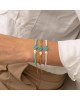 Χειροποίητο βραχιόλι της Excite Fashion Jewellery, με κοχυλάκι, τιρκουάζ οβάλ σταυρό και χαντρες. B-1765-30 Κοσμήματα