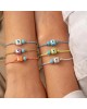 Χειροποίητο βραχιόλι της Excite Fashion Jewellery, fluo πράσινο κορδόνι, ματάκι κύβος, τιρκουάζ χάντρα, και χρυσές μπίλιες. B-1774-08 Κοσμήματα