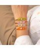 Χειροποίητο βραχιόλι μακραμέ της Excite Fashion Jewellery, πορτοκαλί κορδόνι και κρυσταλλάκια, επίχρυσο λευκό ματάκι με σμάλτο. B-1776-22 Κοσμήματα Χειροποίητο βραχιόλι μακραμέ της Excite Fashion Jewellery, πορτοκαλί κορδόνι και κρυσταλλάκια, επίχρυσο λευκό ματάκι με σμάλτο. B-1776-22 Κοσμήματα