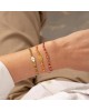Χειροποίητο βραχιόλι μακραμέ της Excite Fashion Jewellery, πράσινο κορδόνι, οβάλ επίχρυσο ματάκι με λευκό σμάλτο B-1784-08, και χρυσές μπίλιες. Κοσμήματα