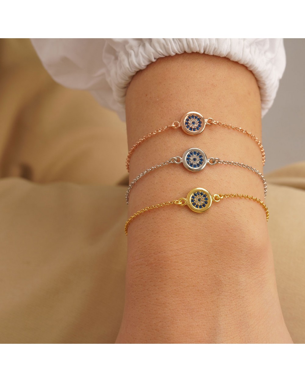 Βραχιόλι ματάκι Excite Fashion Jewellery με λευκά και μπλέ ζιργκόν από επιχρυσωμένο ασήμι 925. B-38-AS-G-62 Κοσμήματα Βραχιόλι ματάκι Excite Fashion Jewellery με λευκά και μπλέ ζιργκόν από επιχρυσωμένο ασήμι 925. B-38-AS-G-62 Κοσμήματα
