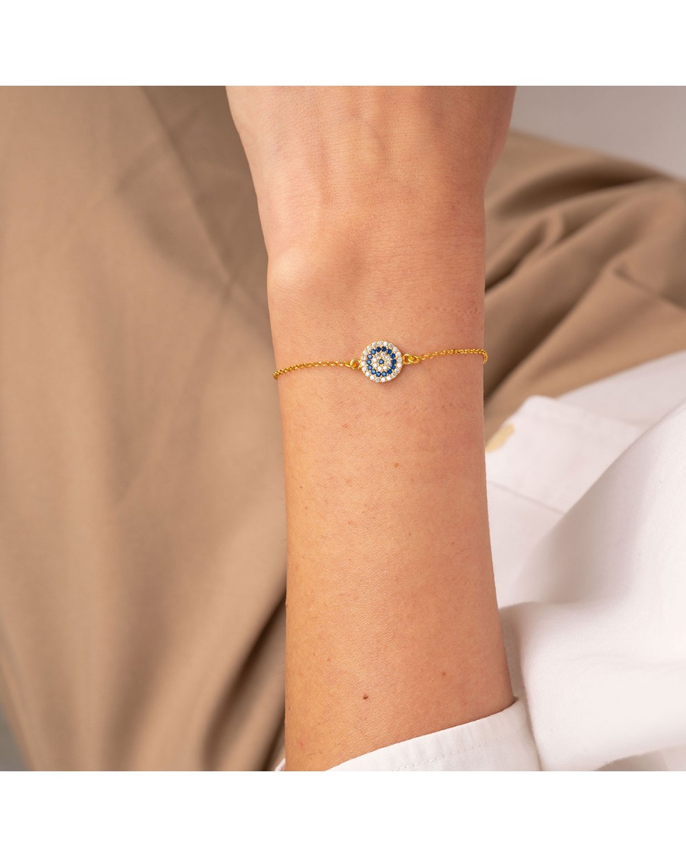 Βραχιόλι ματάκι στόχος της Excite Fashion Jewellery στολισμένο με λευκά και μπλε ζιργκόν από επιχρυσωμένο ασήμι 925. B-61-AS-G-59 Κοσμήματα Βραχιόλι ματάκι στόχος της Excite Fashion Jewellery στολισμένο με λευκά και μπλε ζιργκόν από επιχρυσωμένο ασήμι 925. B-61-AS-G-59 Κοσμήματα