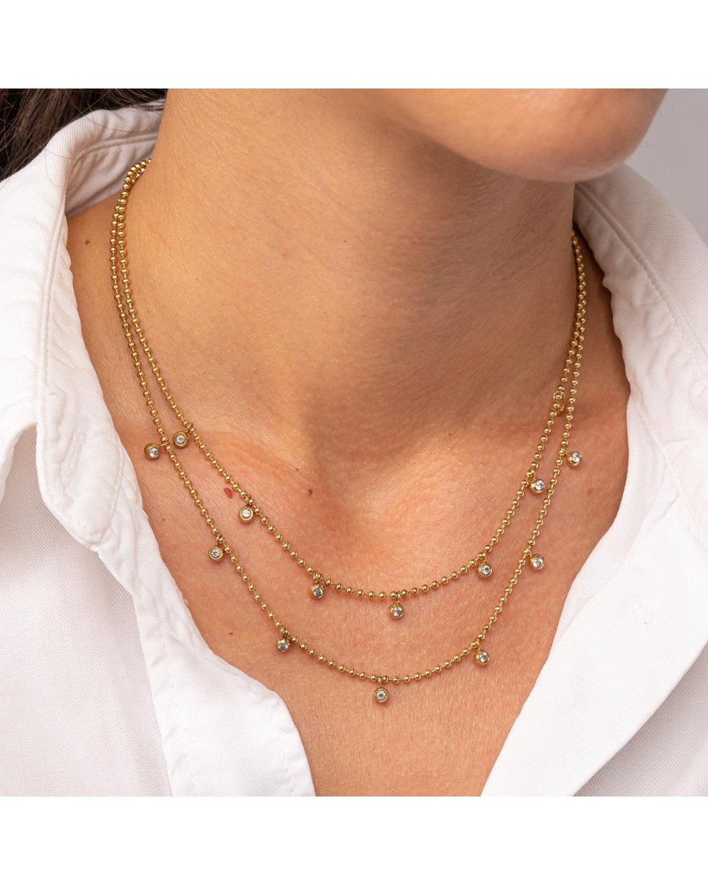 Κολιέ διπλή αλυσίδα dots Excite Fashion Jewellery με κρεμαστά λευκά ζιργκόν από επιχρυσωμένο ανοξείδωτο ατσάλι. N-YH365A-G-95 Κοσμήματα Κολιέ διπλή αλυσίδα dots Excite Fashion Jewellery με κρεμαστά λευκά ζιργκόν από επιχρυσωμένο ανοξείδωτο ατσάλι. N-YH365A-G-95 Κοσμήματα